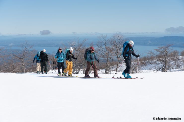 Leaving the lenga forest in the middle of winter. Lake Villarrica in the background.